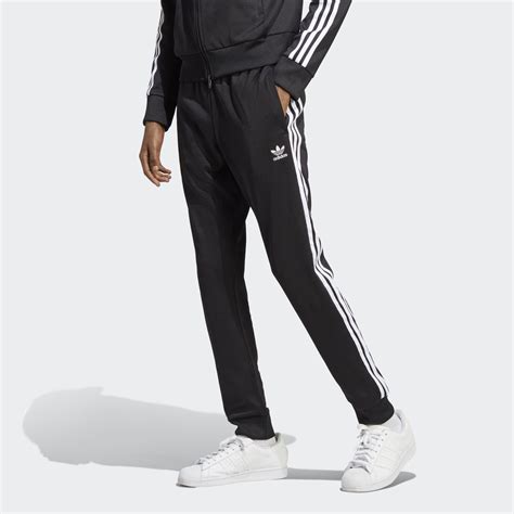 adidas track pants and boots.